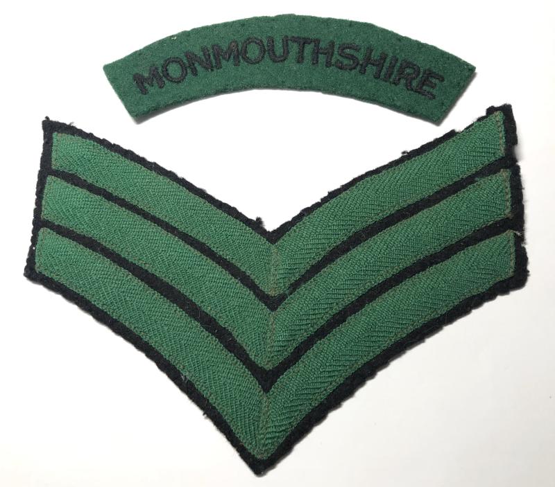 Welsh. Monmouthshire Regiment WW2 cloth title and sergeant's chevrons