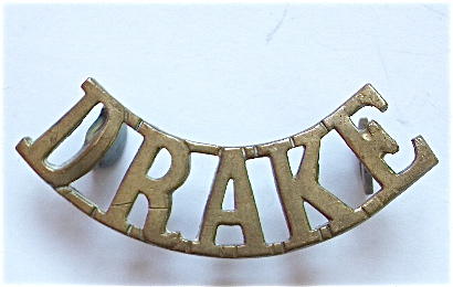 DRAKE WW1 RND (Royal Naval Division) brass shoulder title.