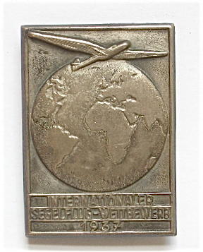 1937 German Third Reich Internationaler Segulflug-Wettbewerb pressed tinnie badge.