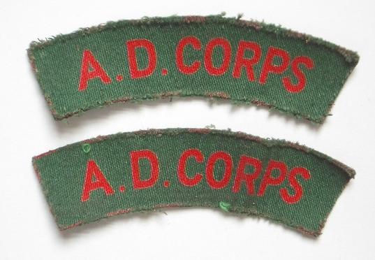 A.D. CORPS pair of WW2 printed shoulder titles.