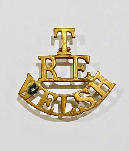 T / RE / WELSH post 1908 Royal Engineers brass shoulder title.