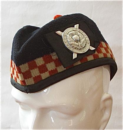 Shanghai Scottish Other Rank?s glengarry with badge circa 1914-41..