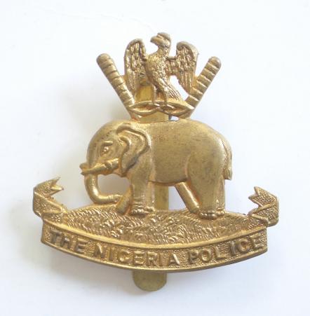 The Nigeria Police Brass Cap Badge by Firmin London.