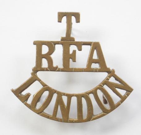T / RFA / London brass Royal Field Artillery shoulder title circa 1908-21..