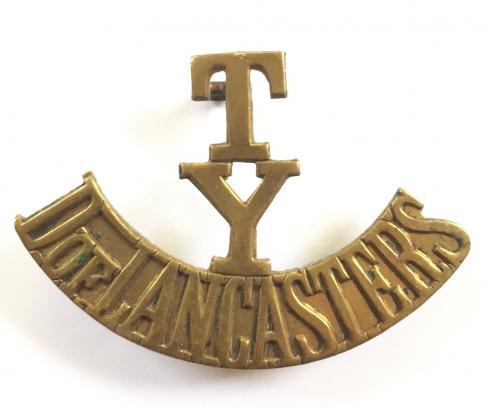 T / Y / D OF LANCASTERS brass shoulder title.