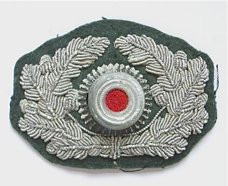 German Third Reich Army Officer's peaked cap wreath and roundel,