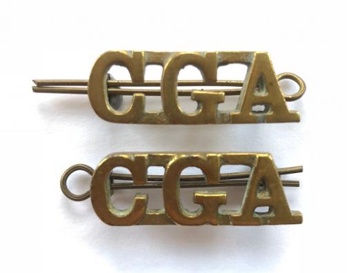 CGA pair of Ceylon Garrison Artillery post 1918 shoulder titles.