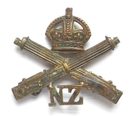 New Zealand Machine Gun Corps WW1 brass cap badge with JR Gaunt, London tablet.