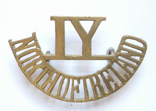 IY / NORTH OF IRELAND scarce brass Irish shoulder title.