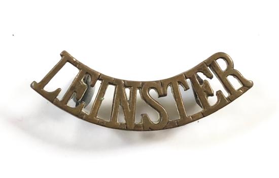 LEINSTER scarce pre 1922 Officer's brass Irish shoulder title.