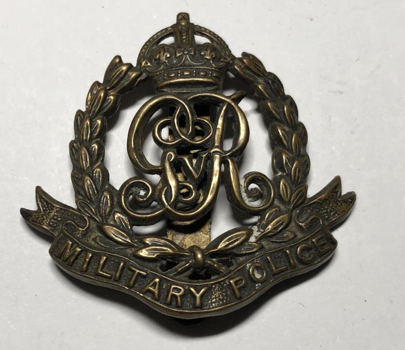 Corps of Military Police GvR cap badge c1910-36.