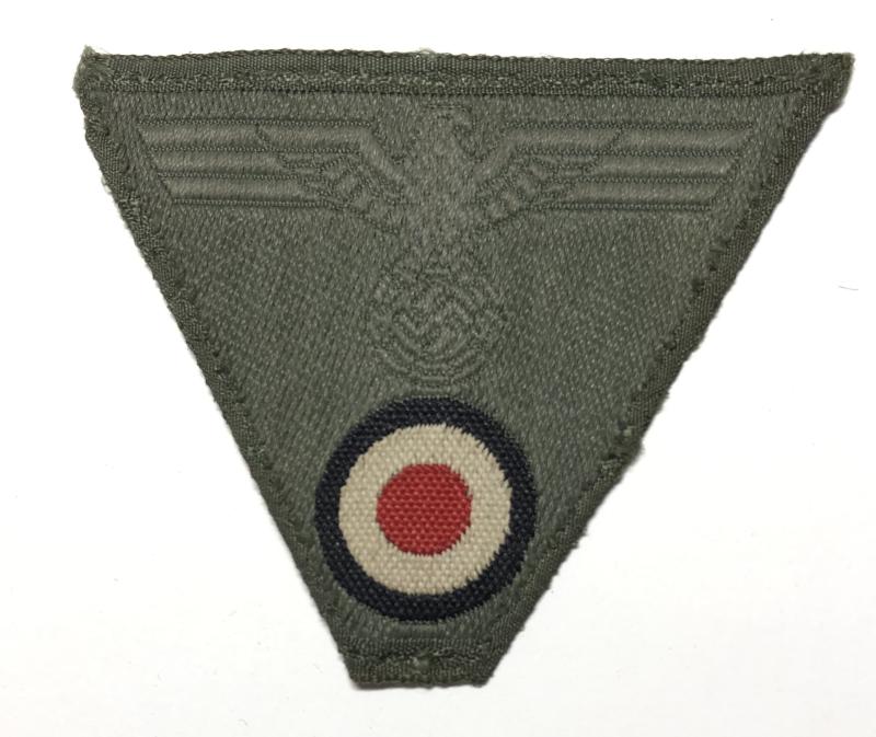 German Third Reich M43 cloth Eagle , swastika and roundel cap badge (trapezoid).