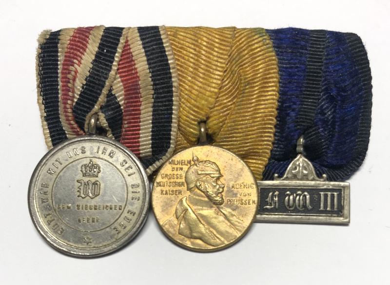 Imperial German group of three miniatue medals.