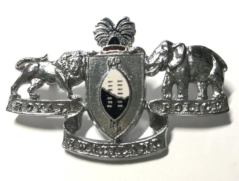 Royal Swaziland Police cap badge.