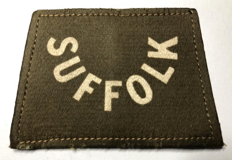 Suffolk Regiment WW1 slip-on shoulder title.
