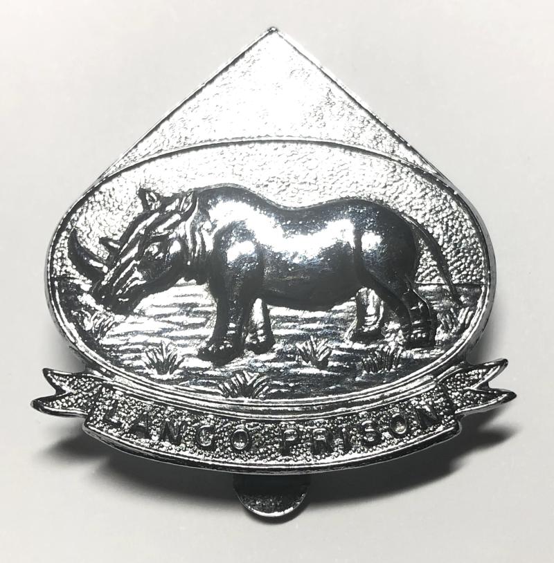 Uganda. Lango Prison cap badge by Firmin, London.