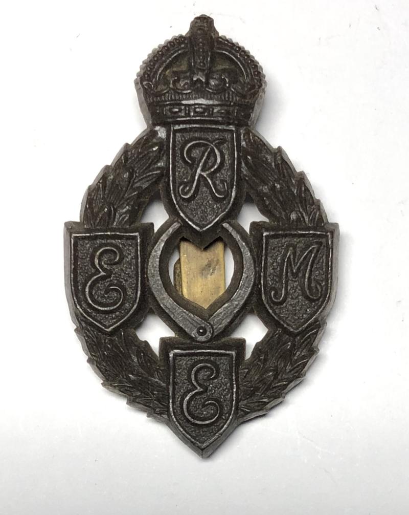 Royal Electrical & Mechanical Engineers WW2 REME plastic ecomomy cap badge.