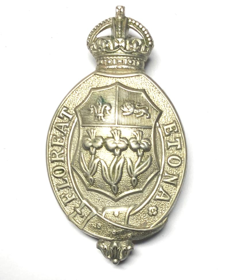 Eton College OTC cap badge.
