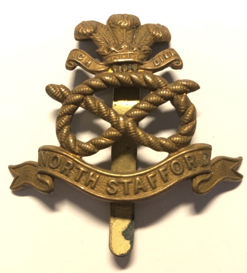 North Staffordshire Regiment WW1 1916 all brass economy cap badge.