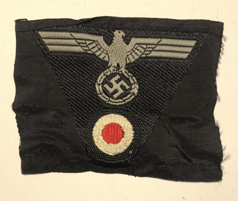 German Third Reich Heer Panzer M43 cap eagle & swastika over roundel.