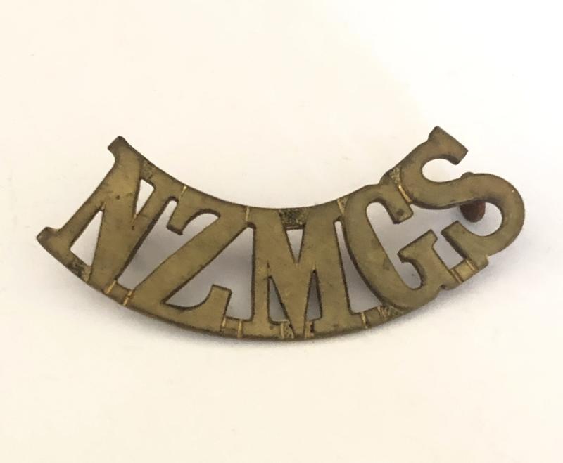 NZMGS WW1 New Zealand Machine Gun Section shoulder title by Stokes & Sons.