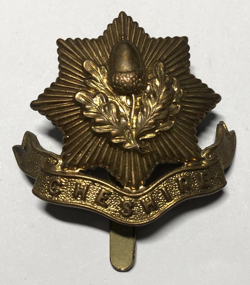 Cheshire Regiment 1916-18 brass economy cap badge.