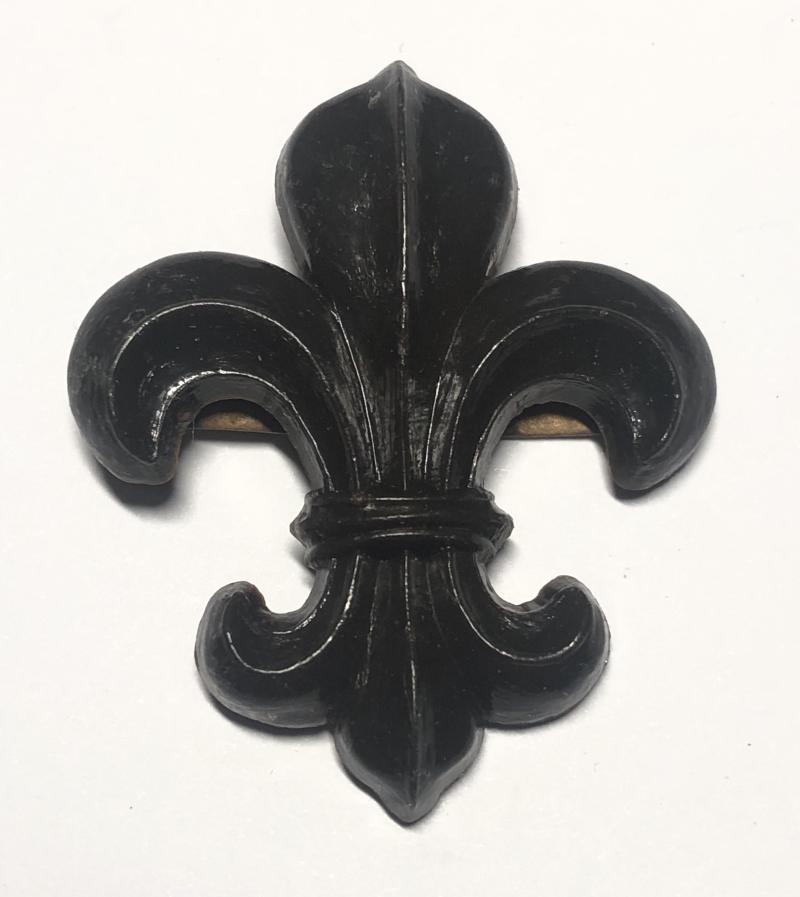 Manchester Regiment WW2 plastic economy cap badge