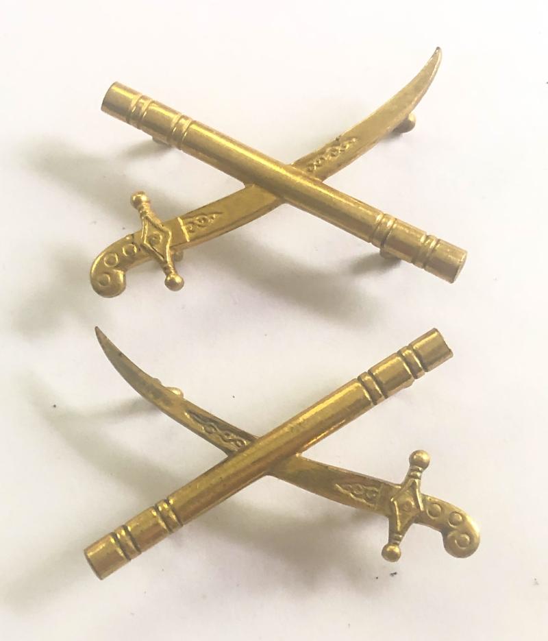 WW1 General's pair of crossed sword and baton shoulder rank badges.