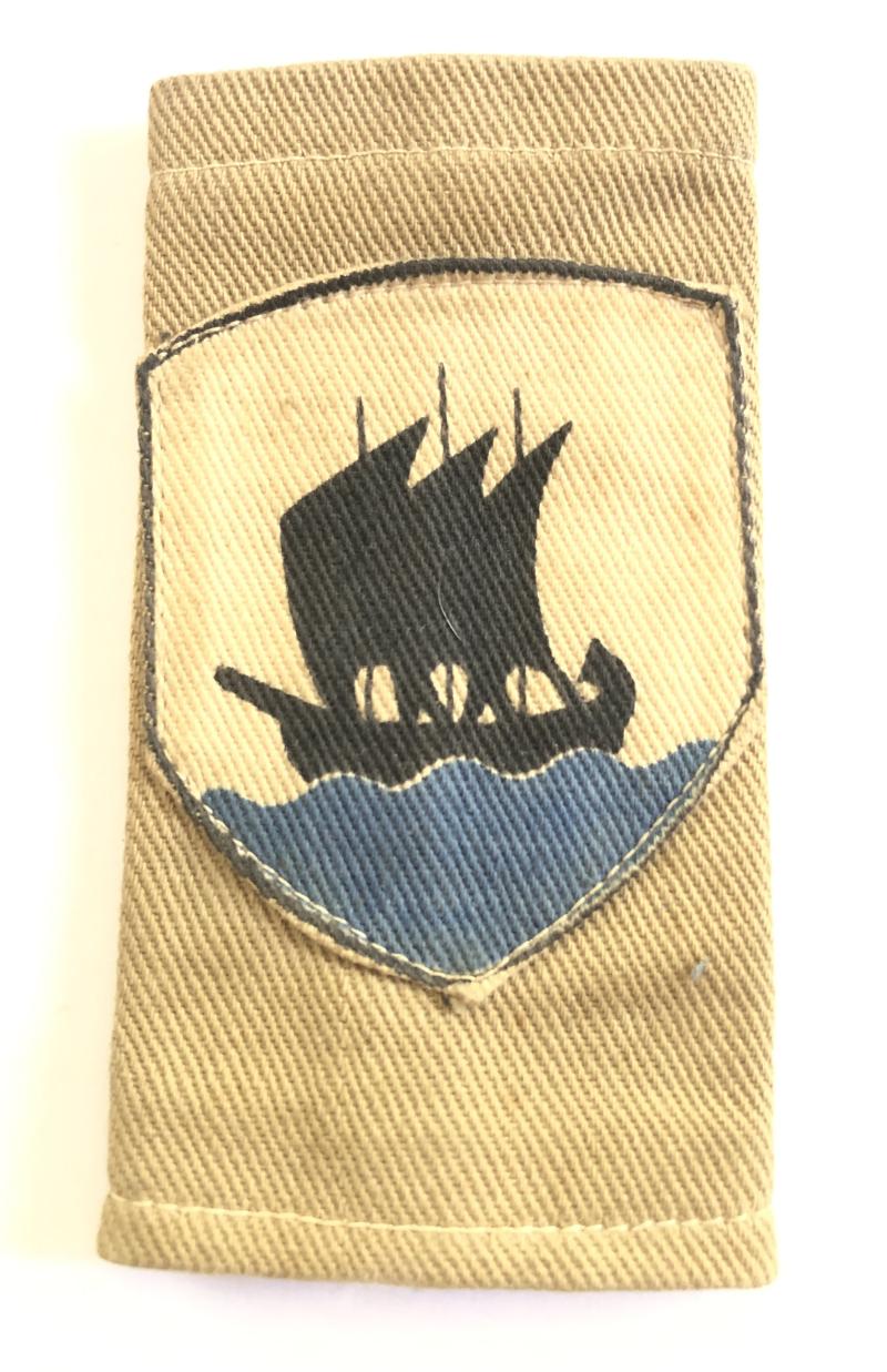 Tripolitania District formation sign stiched to KD slide.