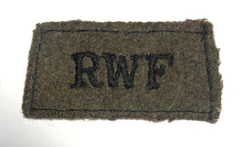 Royal Welch Fusiliers WW2 slip-on shoulder title.