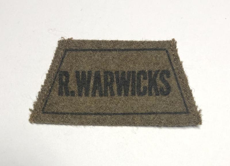 R. WARWICKS printed WW2 slip-on shoulder title.